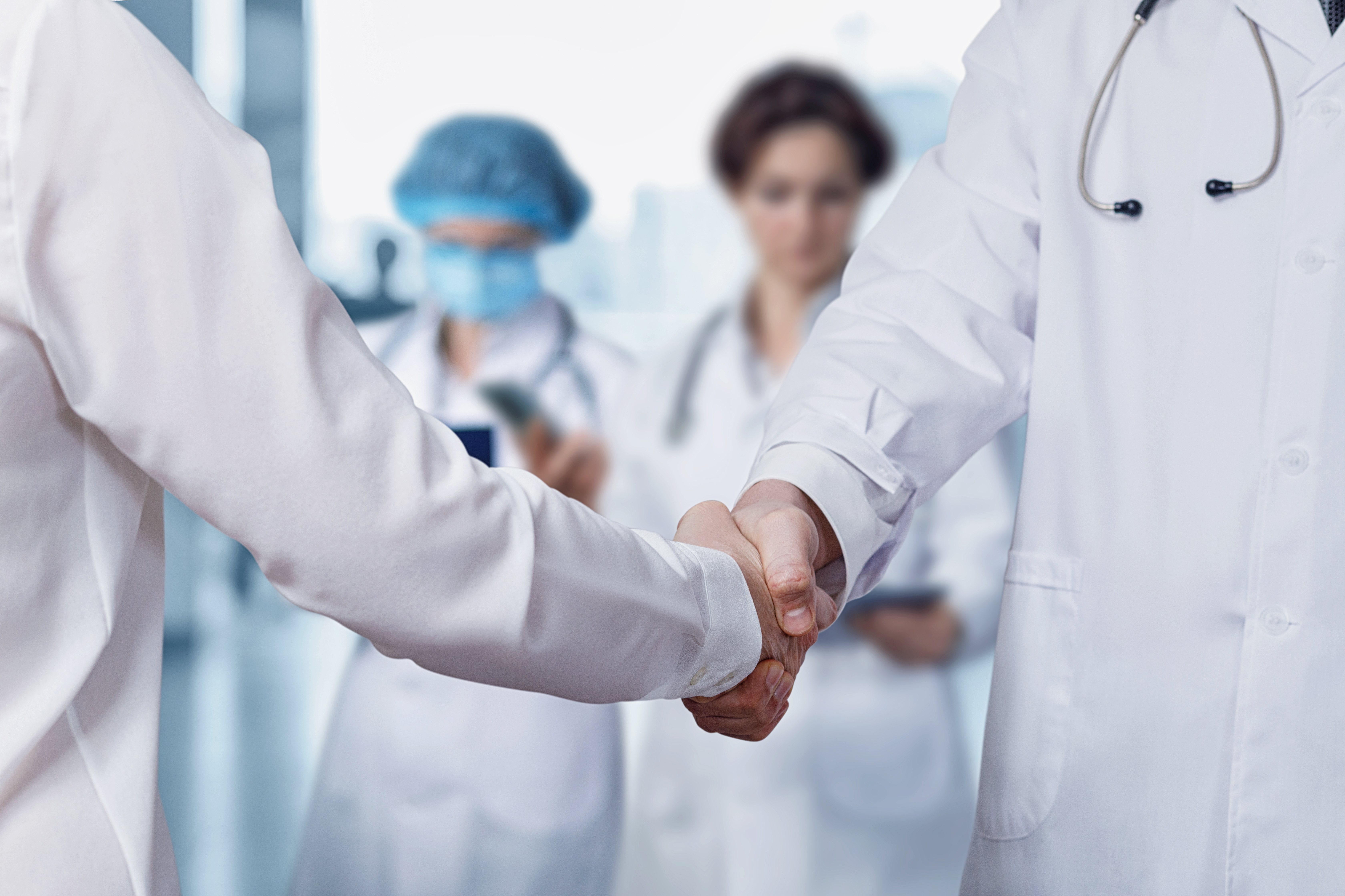 new physician shaking hands